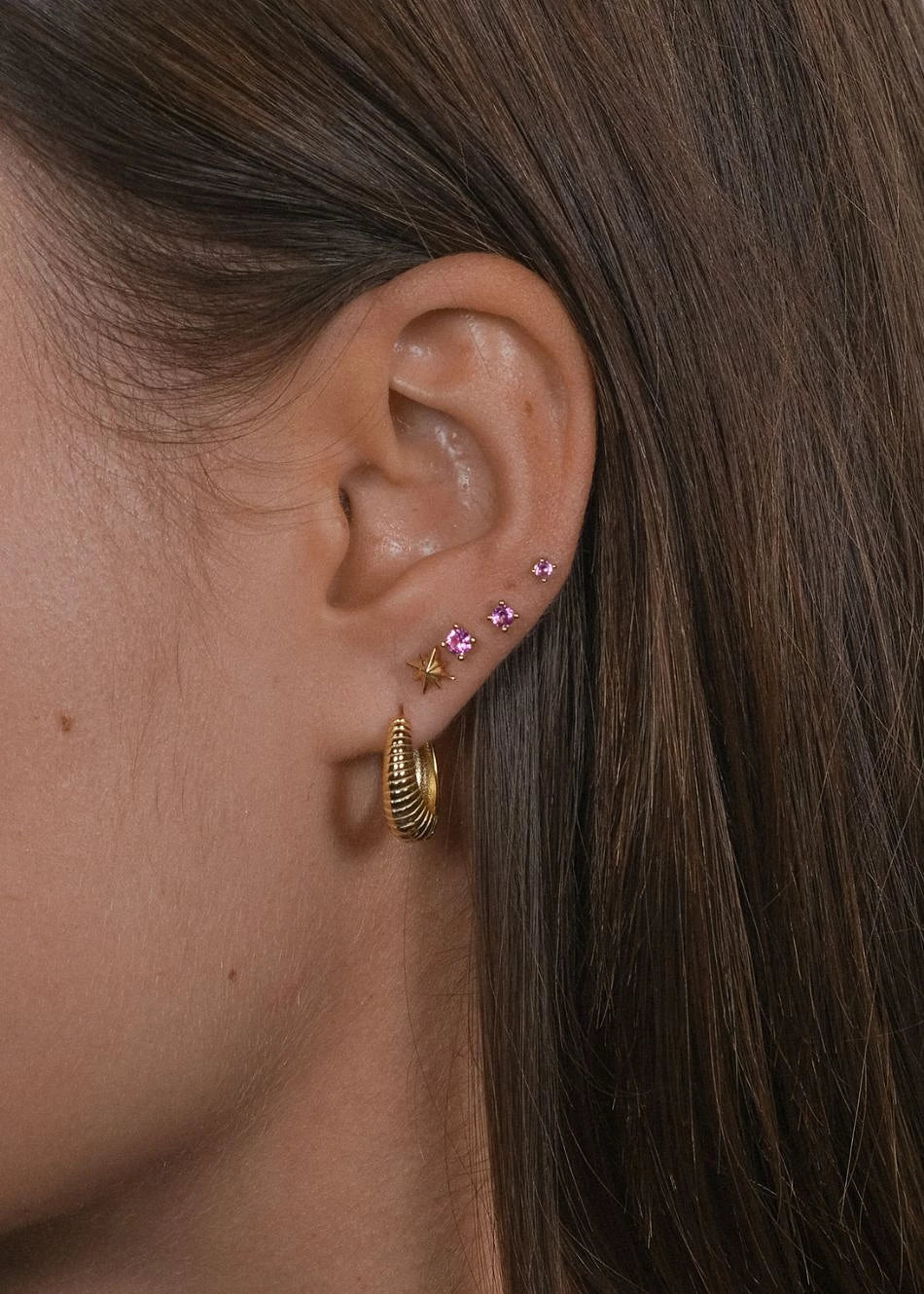 Piercing Brillo Fucsia puesto